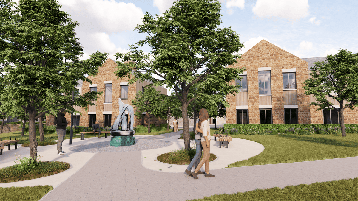 Winding, tree-lined pathways through sustainable housing at Langarth Garden Village.